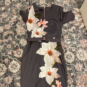 Brand new Ted Baker dress. I am 5ft comes a little below me knees. Never worn!